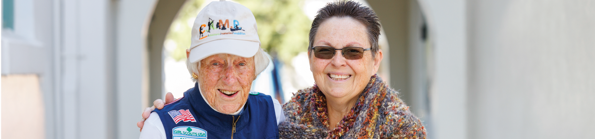  adult woman girl scout volunteer outdoors smiling 