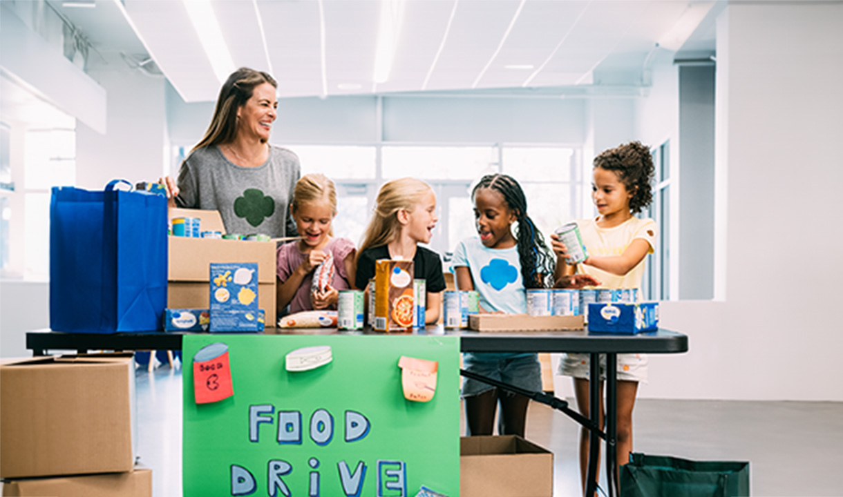 A troop running a food drive booth